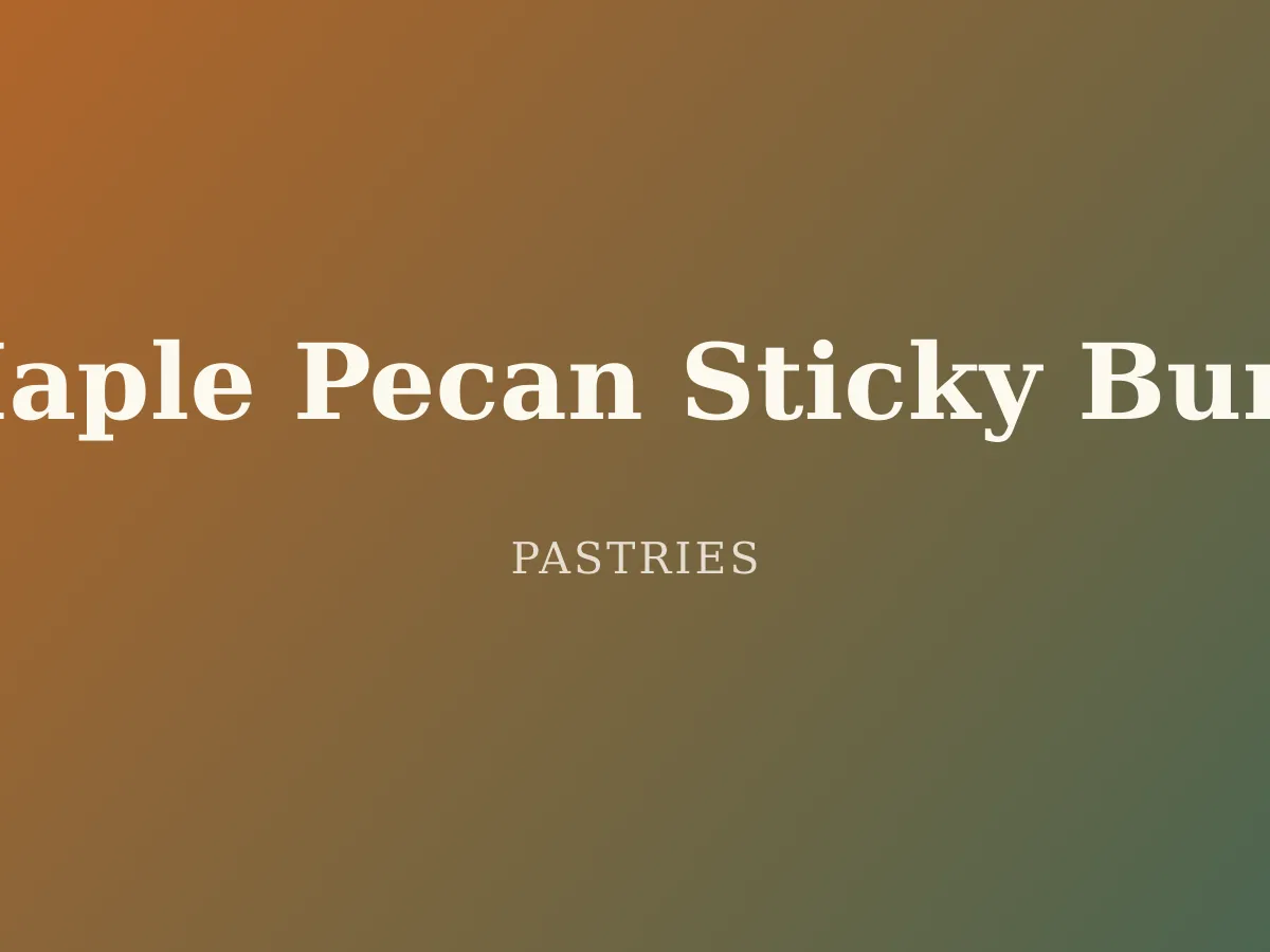 Maple Pecan Sticky Buns — a tray of six sticky buns glazed in maple caramel and pecans